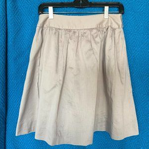 cream/tan colored mini skirt